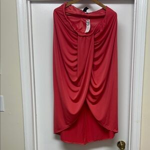 Skirt & TOP. PTP is 22-27. Excellent stretch on both. Dark coral is the color